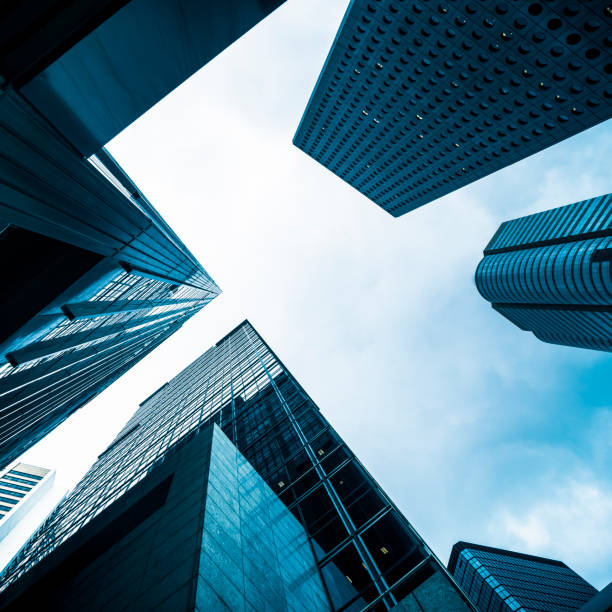 istock directly below of modern buildings against sky 1145138679