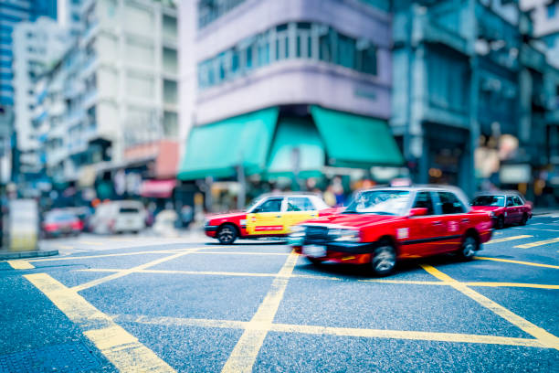 istock taxi motion blur on Mong Kok street 1145140342