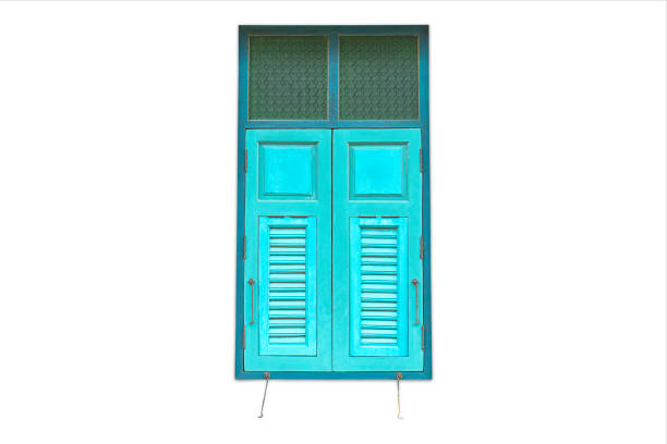 Isolated Wooden window with green glass on a white background with clipping path.