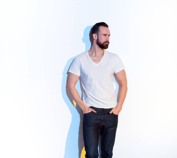 istock Handsome man standing with white shirt on white background 1145150225
