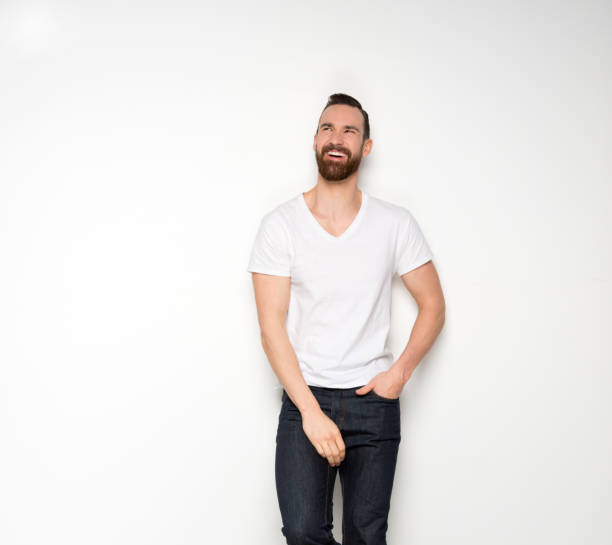 istock Handsome man standing with white shirt on white background 1145150819