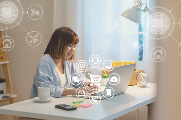 istock Asian woman using Laptop or computer payment shopping online with icon customer network connection on screen and connecting with omni channel system. Young woman satisfied with CRM system 1145152206