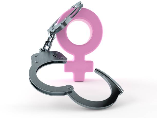 istock Female gender symbol with handcuffs 1145152273