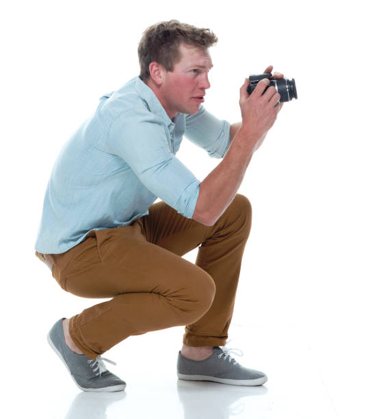 istock Handsome male photographer 1145153576