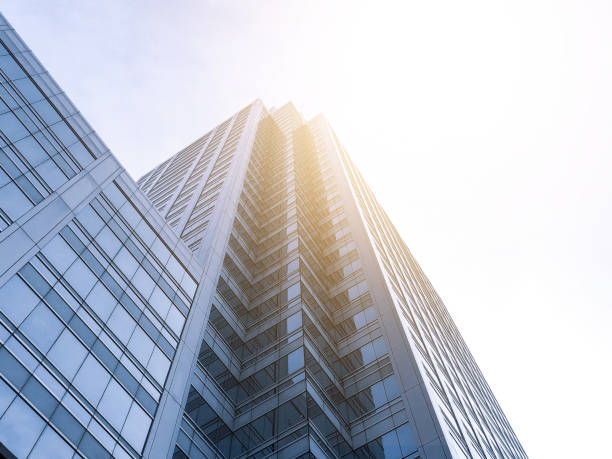 istock Office buildings stretch up to the sky with sunlight. 1145158328