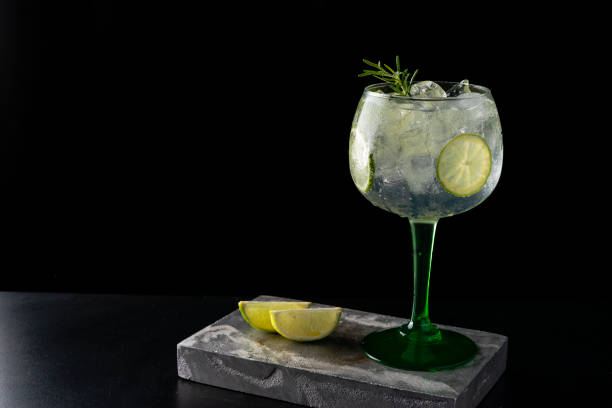 Gin tonic cocktail is on the bar. Space for text. Photo for the menu