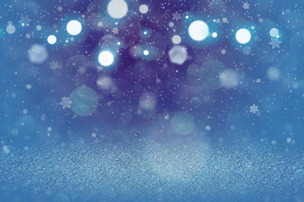 istock cute shiny glitter lights defocused bokeh abstract background with falling snow flakes fly, festal mockup texture with blank space for your content 1145162473