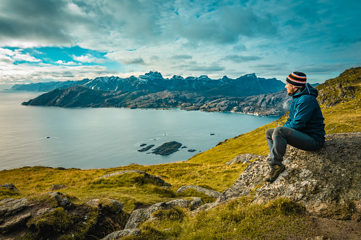 Scenic view from Nonstinden over Nappstraumen sound and the mountains of Flakstadøya at Lofoten Islands in Norway