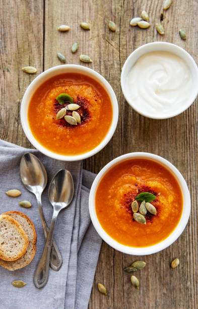 istock Bowls of pumpkin soup 1145163784