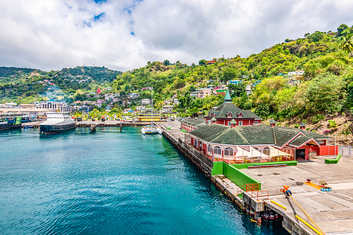 Harbor landscape and cruise port of Kingstown, Saint Vincent and the Grenadines. Bright and colorful travel image. Clouds sky.