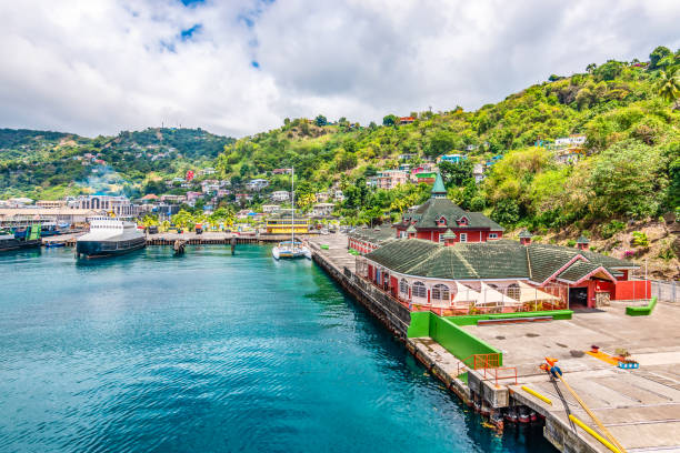 Port of Kingstown, St Vincent and the Grenadines Harbor landscape and cruise port of Kingstown, Saint Vincent and the Grenadines. Bright and colorful travel image. Clouds sky. saint vincent and the grenadines stock pictures, royalty-free photos & images