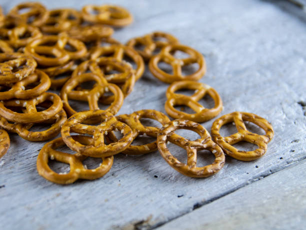 istock Crackers with salt and sauce on a wooden background 1145171000