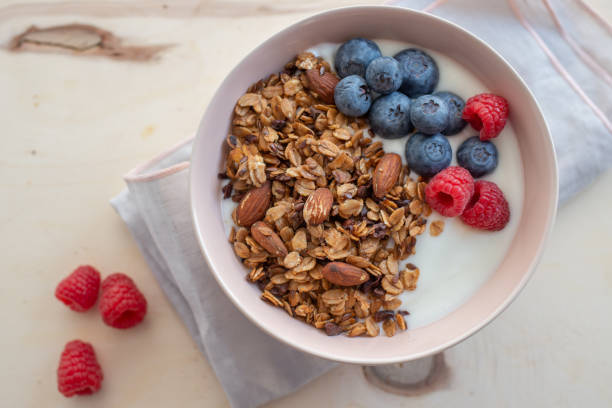 istock Granola with yogurt and berries 1145171108