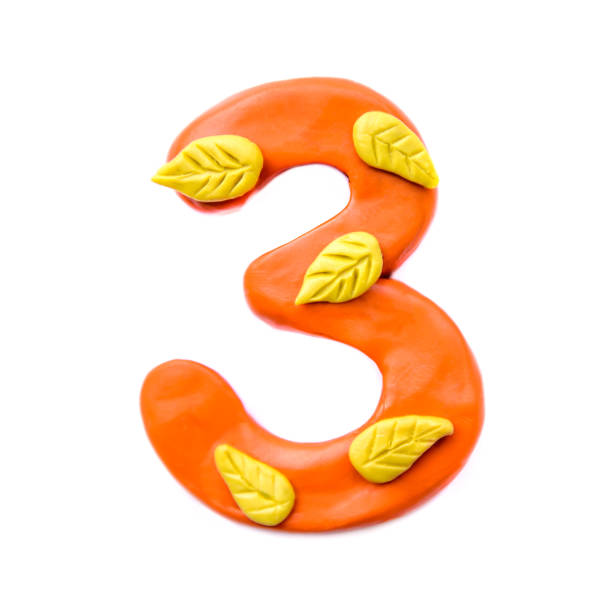 istock Plasticine number 3 with autumn leaves 1145171882