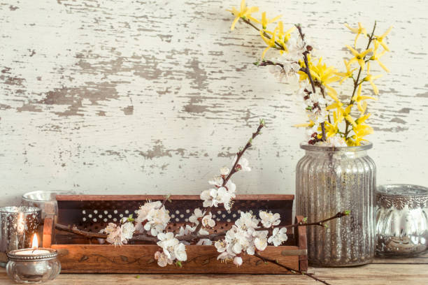 istock Home decor on wooden background with spring flowers 1145173642