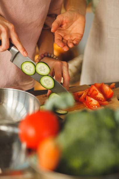 istock Cutting up vegetables for a salad 1145178565