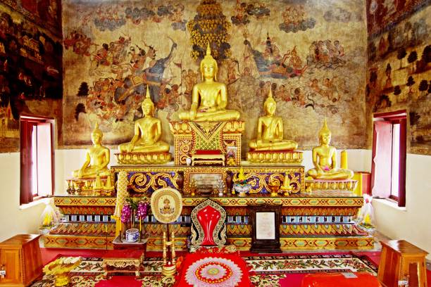 istock Gold Buddha and mural painting in Temple. 1145180089