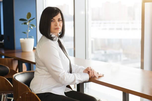 istock Freelancer woman working at co-working or creative space 1145181412