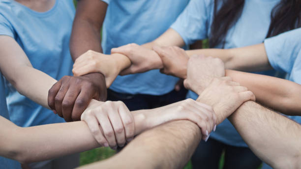 istock Hands of young people joined in circle 1145183173