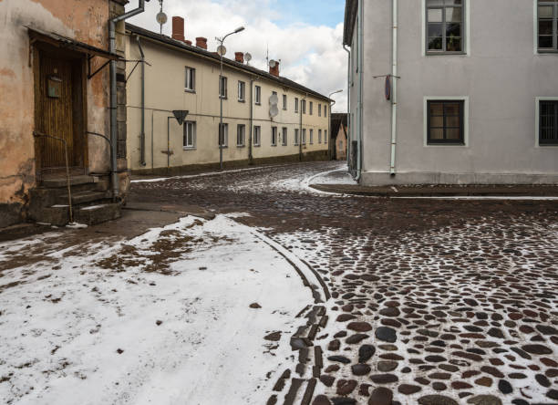 istock Old houses on street. 1145183346