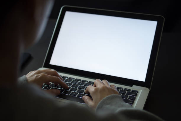 istock Freelancer woman working with laptop at night 1145184025