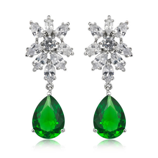 istock Pair of emerald earrings isolated on white background 1145184851
