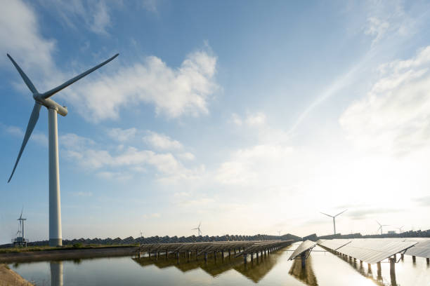 istock Solar panels and wind power, clean energy in nature 1145184912