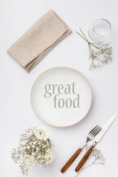 istock Empty white plate and cutlery on a napkin 1145186961