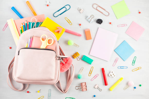 istock Student backpack and various school supplies. Studing, education and back to school concept 1145187857