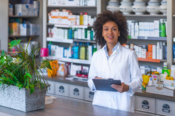 istock African american pharmacist looking at camera smiling 1145189073