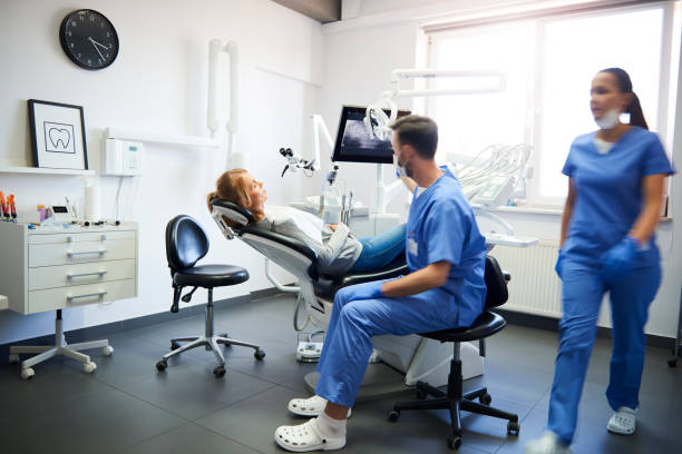 blurred view of busy dentists at work