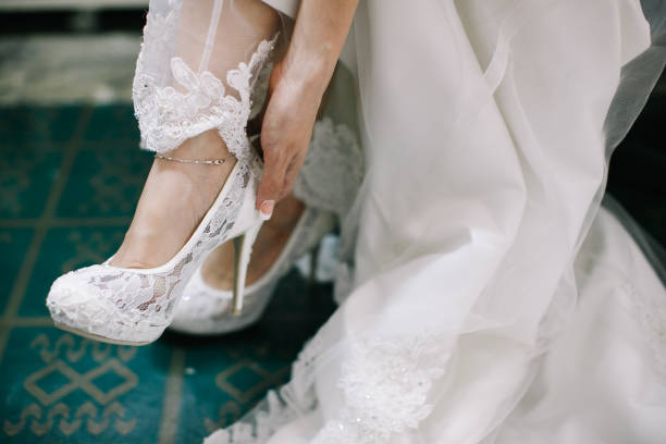 istock Bride wearing wedding heels on wedding day 1145190716