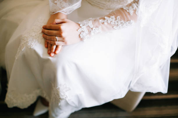 istock Bride dressed in white wedding gown waiting for bridegroom 1145192492