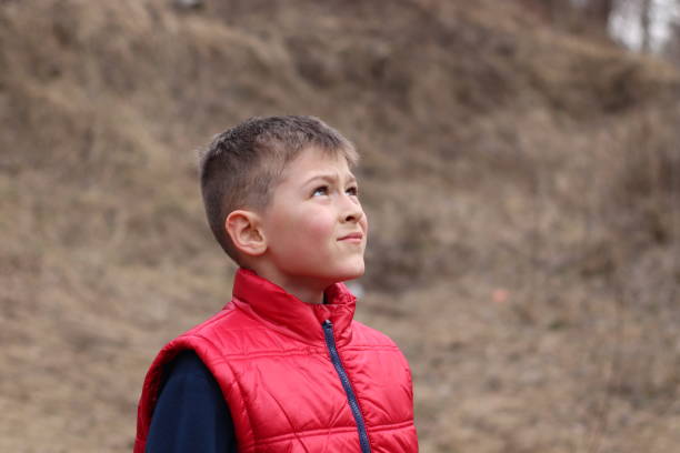 istock Cute model boy demonstrating hope and expectations emotions 1145196006