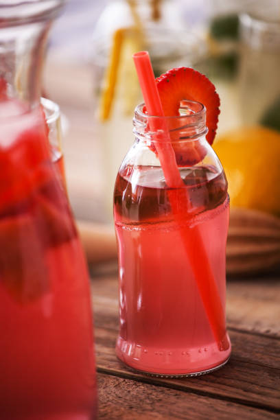 Strawberry lemonade fresh made in glass, close-up