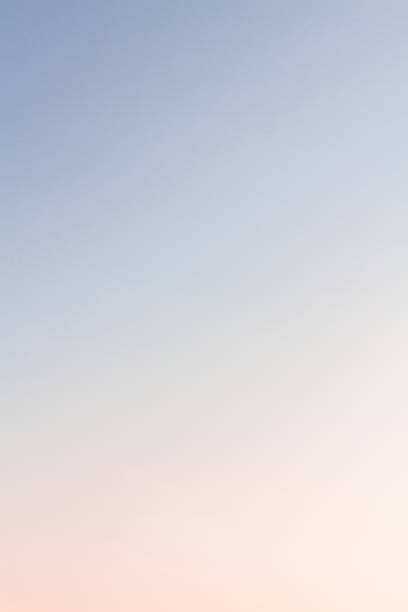 istock Beautiful sunset sky with feathery pink clouds in spring 1145199215
