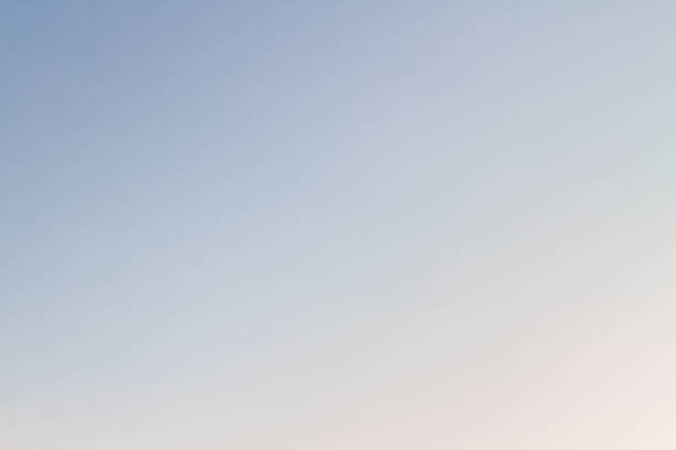 istock Beautiful sunset sky with feathery pink clouds in spring 1145199220