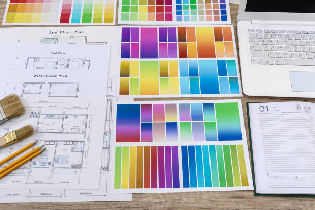 istock Diary with pen and color swatch on house plan in office 1145199715