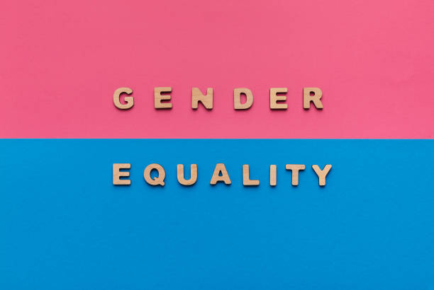 istock Gender equality words on pink and blue background 1145201784