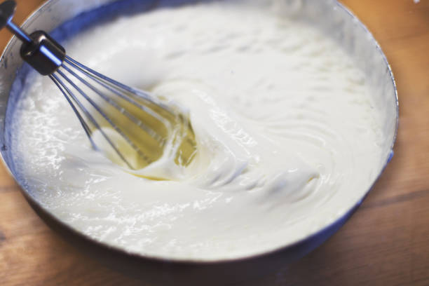 istock cream is whipped with a mixer in a bowl 1145204603