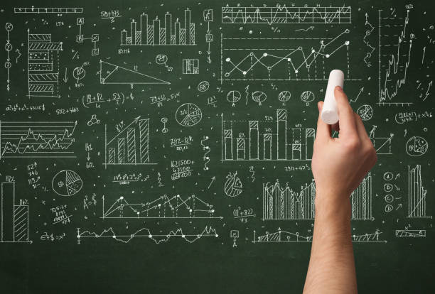 istock A business person drawing data on chalkboard 1145204632