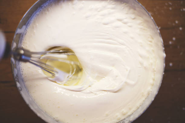 istock cream is whipped with a mixer in a bowl 1145204635