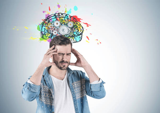 istock Stressed casual man, gear brain 1145206138