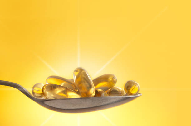 Vitamin D sunshine pill stock photo
