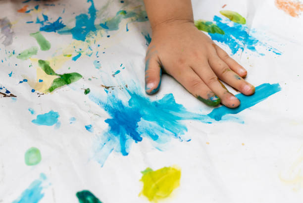 istock Child paint with watercolors. Education concept. 1145207752