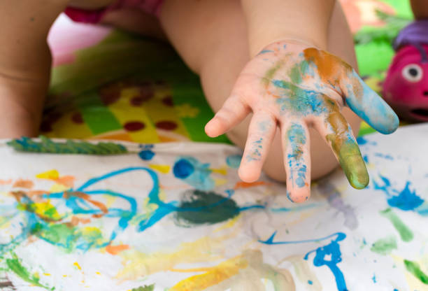 istock Child paint with watercolors. Education concept. 1145207769