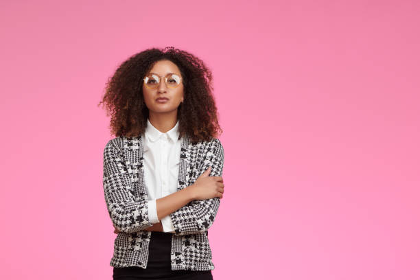 istock Business woman with glasses looking serious 1145207938