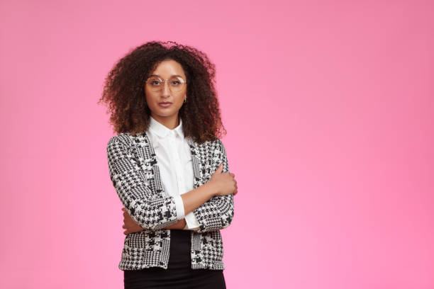 istock Business woman with glasses looking serious 1145207984