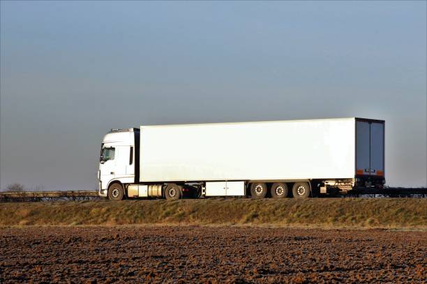 istock Truck on the highway (left-hand traffic) 1145209020