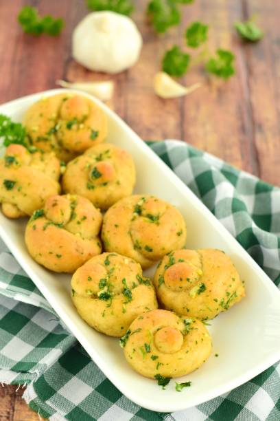 istock Garlic Knots with Herb Butter Sauce 1145209375